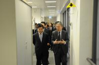 Prof. Chan Wai-ee (front right) guided Mr. Li Jiheng (front left) and the delegation to tour our major facilities